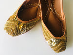 Esther Jutti with golden shimmer